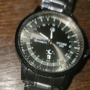 Black Quartz Watch with Green Accents